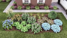 an aerial view of a house with flowers in the front yard