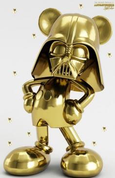 a gold mickey mouse with a helmet on it's head and ears, standing in front of a white background