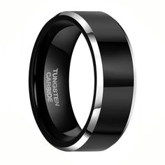 black and silver wedding band with an inscription on it