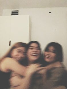 a group of people that are hugging each other