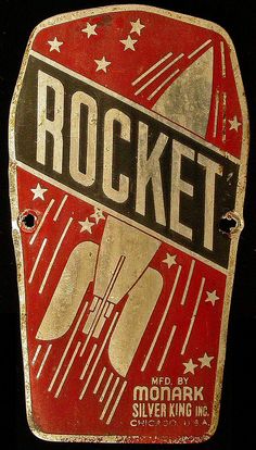 an old rocket advertising sign on a black background