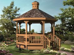 a wooden gazebo sitting on top of a lush green field