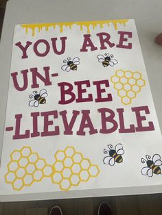 a sign that says, you are un - bee - lieevable with bees on it