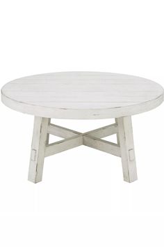 a white wooden table with two crossed legs