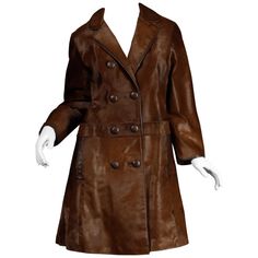 Stunning vintage brown fur coat from the 1960s in incredible condition (rare to find one of these without balding). Drop waist and pleated detail in the bottom back. Fully lined with front double button closure. Hidden side pockets. Fits like a modern size medium. The bust measures 38", waist 39", hips 42", shoulders 16", sleeve length 22" and the total length 39.5". Excellent vintage condition with no noted flaws. Brown Fur Coat, Faux Fur Cape, Silk Kimono Jacket, Celebrities Leather Jacket, Gold Jacket, Fur Cape, Vintage Coats, Cocoon Coat, Brown Fur