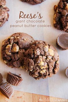 chocolate peanut butter cookies on parchment paper next to cupcakes