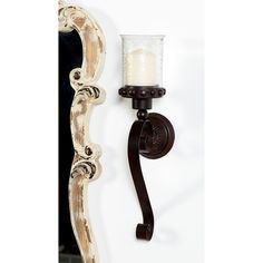 This old world inspired wall sconce candle holder is a great candlelight source and decorative addition for entryways, living rooms, hallways, doorways, and balconies. Can hold 1 pillar candle, not included. This item ships in 1 carton. Wall Scones Decor Ideas, Traditional Wall Sconces, Flared Top, Iron Wall Sconces, Traditional Candles, Led Tea Lights, Updated Traditional, Candle Wall Sconces, Candle Holder Decor