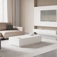 a living room with couches, table and television on the wall in front of it