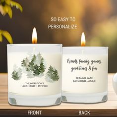 two personalized candles sitting next to each other