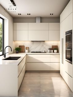 a modern kitchen with marble counter tops and white cabinets