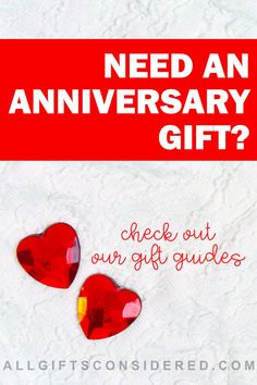 two red hearts with the words need an anniversary gift? check out our gift guides