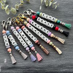 Personalized beaded name charm. Attach to school backpack, lunch bag, daycare bag, diaper bag, purse or keys. Customize yours with up to 9 letters. You may also choose your own custom color combo. Tassel color may be different from picture unless specified but will definitely color match your keychain. ♡If you would like to add a free color matching metal keyring with your charm, please let me know in the personalization box. How to order custom color combo 1-select custom color combo in the 1st Beaded Name Keychains, Backpack Charms Diy, Daycare Bag, Backpack Charms, Keychain Craft, Bracelet Keychains, Personalised Gifts For Friends, Backpack Keychains, Backpack Lunch Bag