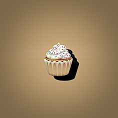 a cupcake with white frosting and sprinkles sitting on a brown background