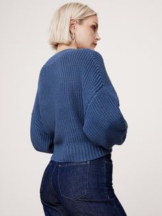 We cut this oversized sweater with a cropped hem, knitting it in our chunky, mercerized cotton yarn—a special process that produces a smoother, silkier handfeel with a signature luster.  Cut in a wedge shape, distinguished by its wide fit at the shoulders that gently tapers towards the hem.  Oversized fit.  Cropped length.  Organic: Made with certified, organically grown cotton that's easier on the earth.  V-neck.  Straight hem.  Oversized fit.  Long sleeves.  Cropped length.  Model: Size S, 5'10" (178cm). Mercerized Cotton Yarn, Crop Sweater, Oversized Sweater, Cotton Sweater, First Look, Cotton Yarn, Oversized Fits, Banana Republic, Cashmere