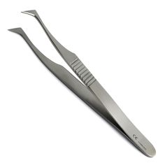 a pair of dental instruments sitting on top of each other