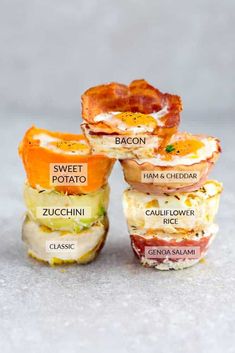 four different types of food stacked on top of each other with the words bacon, ham and cheddar