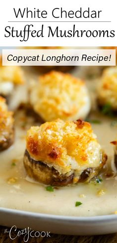 white cheddar stuffed mushrooms with cheese on top