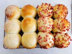 several different types of pastries on a cooling rack