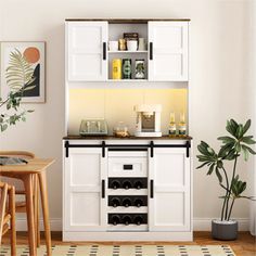 This modern storage cabinet stands out with its stylish design concept, which not only caters to the aesthetic trend of contemporary homes, but also skillfully blends practicality and aesthetics. The frame structure has been carefully crafted to show high stability and durability, ensuring the stability and safety of the locker in daily use. The overall design reflects a modern and minimalist style without losing practical functionality, making it an ideal choice for both aesthetics and practica Bar Sideboard, Hamptons Farmhouse, Rustic Buffet, Coffee Bar Cabinet, Organize Kitchen, Upper Cabinet, Kitchen Utensil Organization, Farmhouse Bar, Cabinet Bar