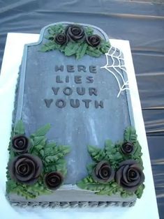 there is a tombstone with roses on it