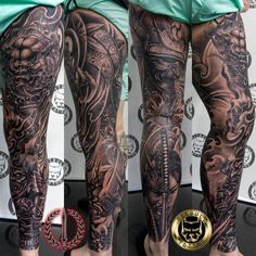 two men with tattoos on their legs and arms, both showing the same tattoo design