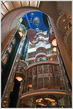 the inside of a large building with multiple floors and balconies on each floor