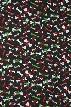 a black background with red, green and white bones and bow ties on it's side