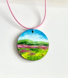 "\"Wildflower scenery\", A unique hand painted women accessory jewelry. A lovely gift idea that can be given to someone dear or for yourself. Hand Painted on wood, varnished and signed on back 1.5 inches or 4 cm base of diameter   19.5 inches or 50 cm length of necklace    Contact me for more information. Thank you for visiting!  God bless you!" Wood Pendant, Original Jewelry, Floral Jewellery, Women Accessories Jewelry, Lovely Gift, Jewelry Art, Wild Flowers, Necklace Lengths, Jewelry Accessories