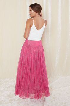 You will feel like a goddess in our gorgeous Zella Lurex Maxi skirt! It can be dressed up with your favorite strappy heels or dressed down with a white tank top and your favorite flat sandals! Such a versatile piece to add to your Summer wardrobe. Flowy Skirt For Summer Party, Feminine Summer Evening Skirt, Flowy Summer Party Skirt, Flowy Skirt For Festive Summer Events, Glamorous Long Summer Skirt, Pink Skirt For Summer Evenings, Pink Skirt For Evening In Summer, Summer Evening Pleated Skirt, Feminine Summer Evening Bottoms