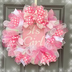 "Pretty in Pink" Celebrate your bundle of joy with this pink and white deco mesh wreath. This wreath is absolutely "Pretty in Pink" with multi-color pinks and white ribbon and bow. The handmade pink wooden sign read's "It's A Girl" in white acrylic paint. New Baby Wreath, Baby Girl Wreath, Wreath Mesh, Skeleton Wreath, Baby Shower Wreath, Jessica Brown, Baby Wreath, Its A Girl