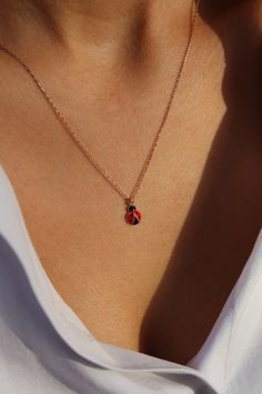 Ladybug to give you all the luck 🐞  Get this beautiful minimalist jewelry made with the quality of perfect elements✨ You can choose 925K Sterling Silver with the options of Gold, Rose Gold or White Gold colors. High quality jewelry for everyone 🤍  Details * 925K Sterling Silver Option → 14K Gold, Rose Gold or White Gold plated * Chain length is approximately 18 inches (16+2 in extender) / 45 cm (40+5 cm extender) * Time is everything! You will receive your package as soon as possible 🚚  * We care about the quality of metal to make sure it will last for a long time * We use enamel technique to color the jewelry and high quality zircons only * There can be tiny differences on each item. Length difference of the chain as well as color changes and shade differences of the stones and enamel Ladybug Beaded Necklace, Tiny Rose Gold Jewelry Gift For Her, Ladybug Necklace, Ladybug Jewelry, Cute Ladybug, Luck Necklace, Handmade Gold Jewellery, Fancy Jewellery Designs, Necklace Cute