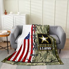 an army blanket with the u s army insignia on it is sitting in a chair