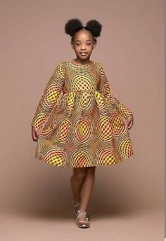 Help your child remember her childhood with this beautiful dress. This is a custom African Girls dress that can be worn for birthdays, photoshoots and other events for babies. Before ordering, please go through the size chart and choose a size for your daughter before checkout. Or you can send her measurement (Chest, Waist, Hip & Dress Length). This is a custom order,it takes 1 week or more during busy sale period to sew and 3-5 business days to ship. If you have any question, please send me a m Ankara Styles For Kids, Grass Fields, African Dresses For Kids, African Fashion Designers, African Dresses Modern, African Children, Dress African, African Fashion Modern, Kids Fashion Dress