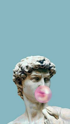 a statue with a pink bubble coming out of it's mouth and the head of a man