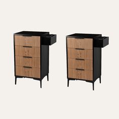 two black and brown drawers with wooden handles on each drawer, one has a planter in the middle