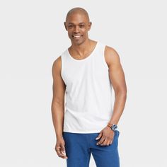 Bring cool comfort to warm-weather days with this Standard-Fit Tank Top from Goodfellow & Co™. Crafted from a lightweight jersey fabric, this standard-fit tank top offers you all-day cool comfort. Falling at the hip for wearing tucked in or untucked, you can coordinate this solid round-neck tee with different bottoms, or layer it under a button-down or hoodie for versatile styling. Goodfellow & Co™: Where style & fit are always in good company. Sporty Cotton Tank Top For Summer, Sporty Relaxed Fit Activewear For Beach, Sporty Beach Activewear With Relaxed Fit, Comfortable Summer Activewear, White Cotton Summer Activewear, Sporty Relaxed Fit Beach Activewear, Casual Beach Season Activewear, Cotton Summer Activewear For Workout, White Sleeveless Summer Activewear