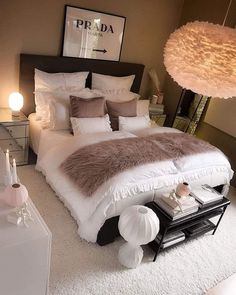 a bedroom with a large bed and white carpet