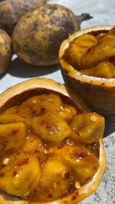 there are three different types of food in the bowl on the table, including bananas and potatoes