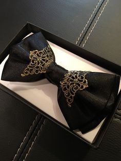 Black satin brass bow tie looks amazing! Total must have!! Adjustable strap, very comfortable to wear. Tie A Necktie, Tuxedo Bow Tie, All Black Suit, Gold Bow Tie, Rosary Style Necklace, Gold Suit, Black Gold Wedding, Professional Clothing, Black Boy