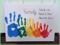 a family hand print is displayed on a card