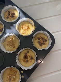 several cupcakes are sitting in the muffin tin