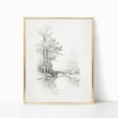 a black and white drawing of a bridge over a river next to a large tree