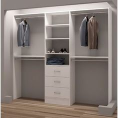 an open white closet with clothes and shoes on the shelves, next to a wooden floor