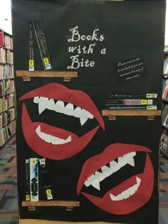 a book display with two mouths on it