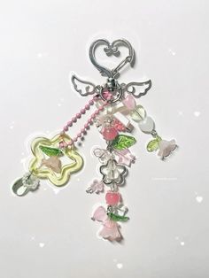 a key chain with charms attached to it