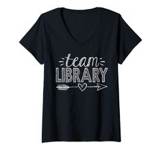 a black shirt that says team library with an arrow and heart on the front, in white