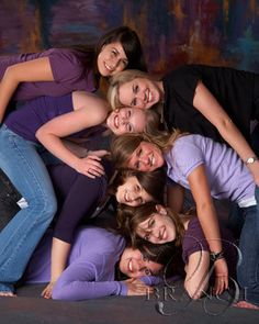 a group of young women posing for a photo