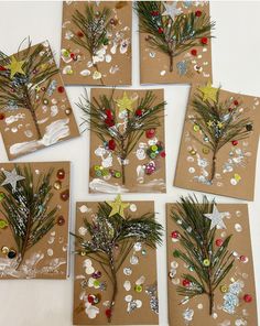 six christmas cards made from brown paper with buttons and pine branches on them, all decorated in different shapes and sizes