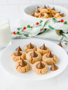 peanut butter blossoms on a white plate.