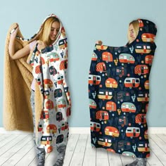 two women wrapped in blankets with campers on them